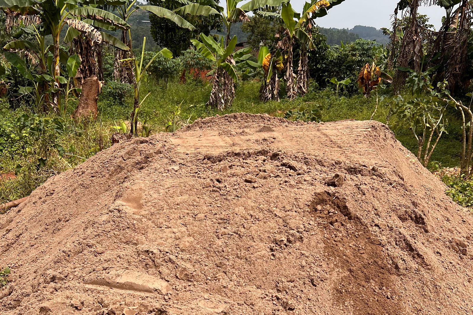 A large pile of building sand on the school site